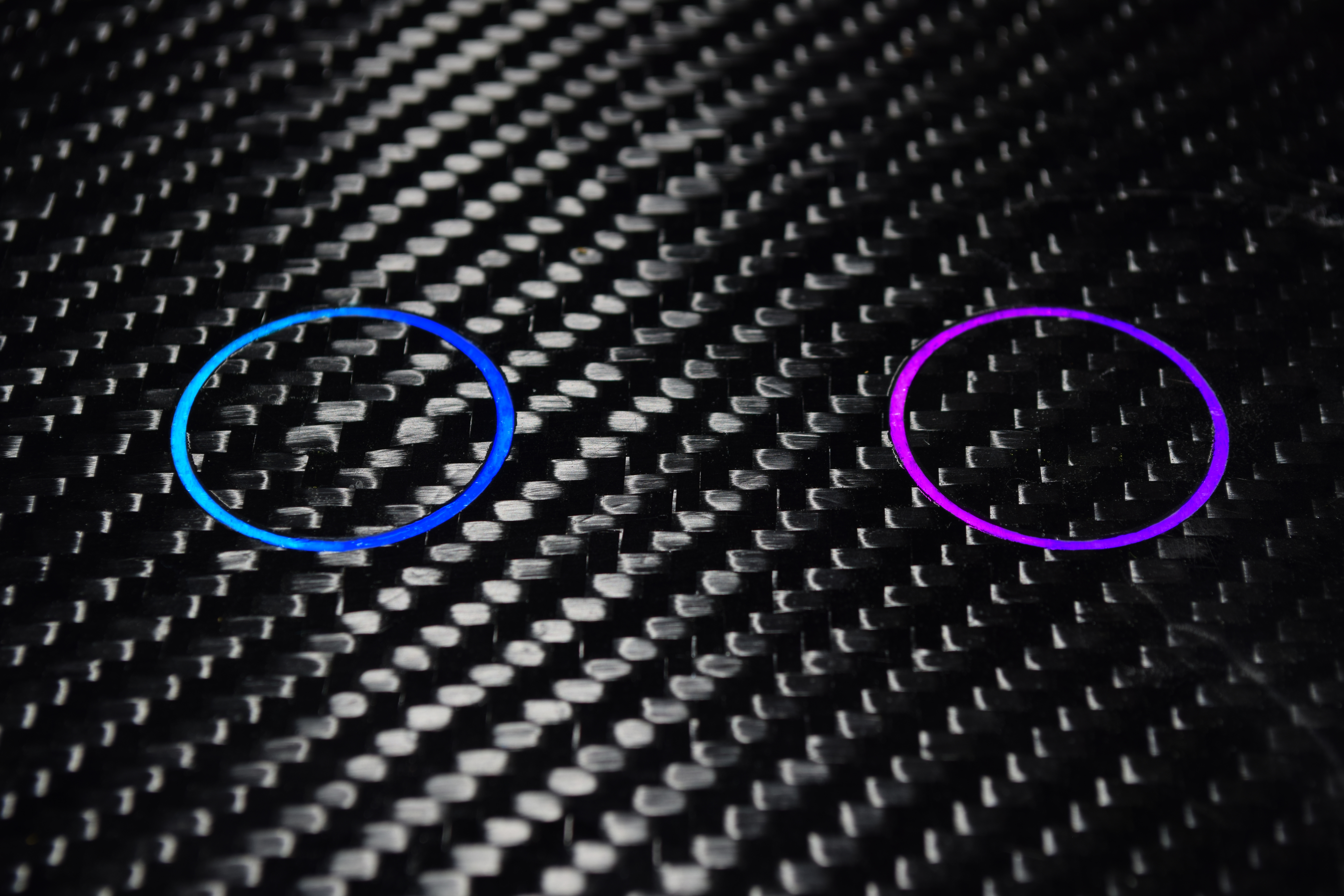 Carbon fiber composite part with visible weave pattern