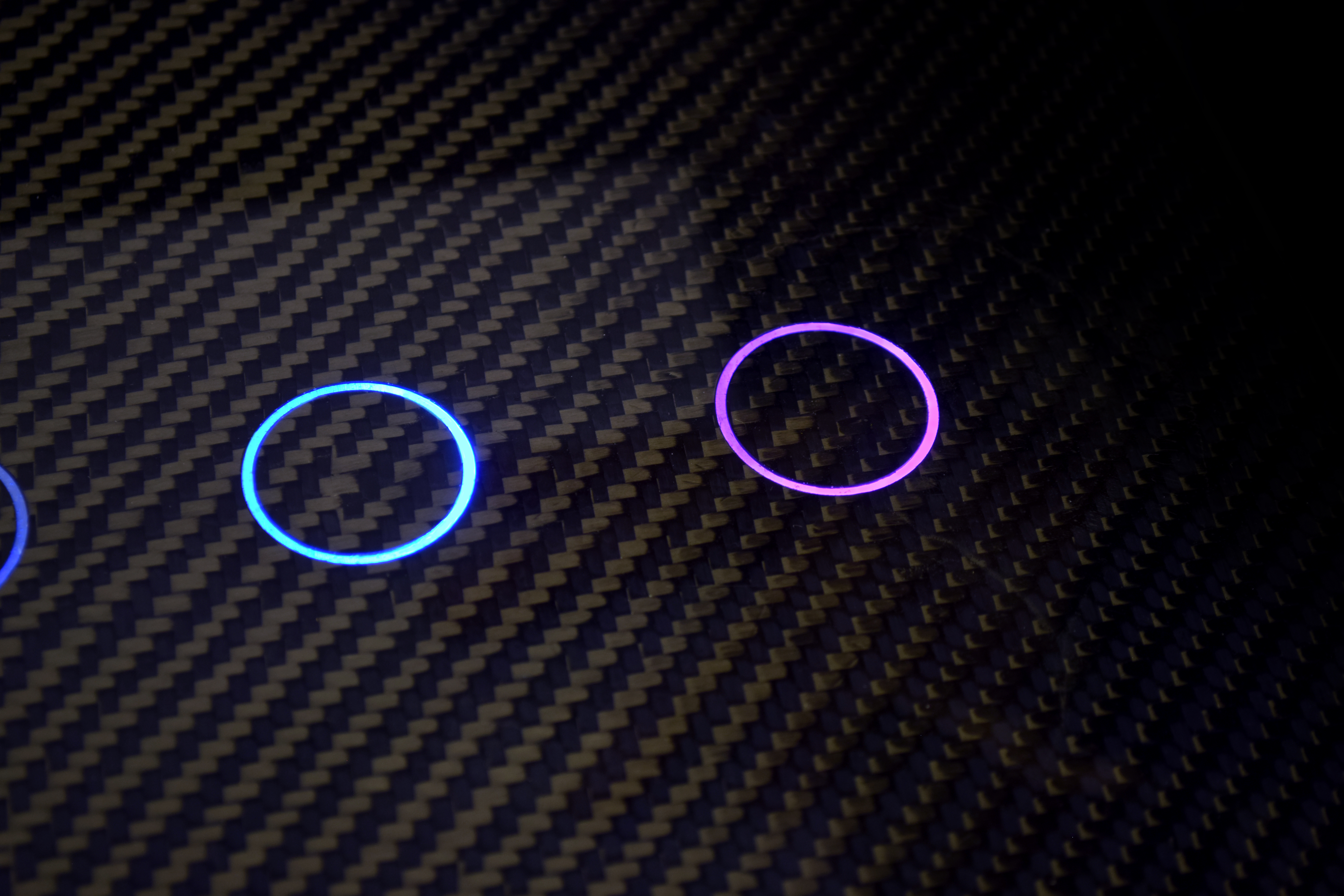 Machined carbon fiber component showing precision finish