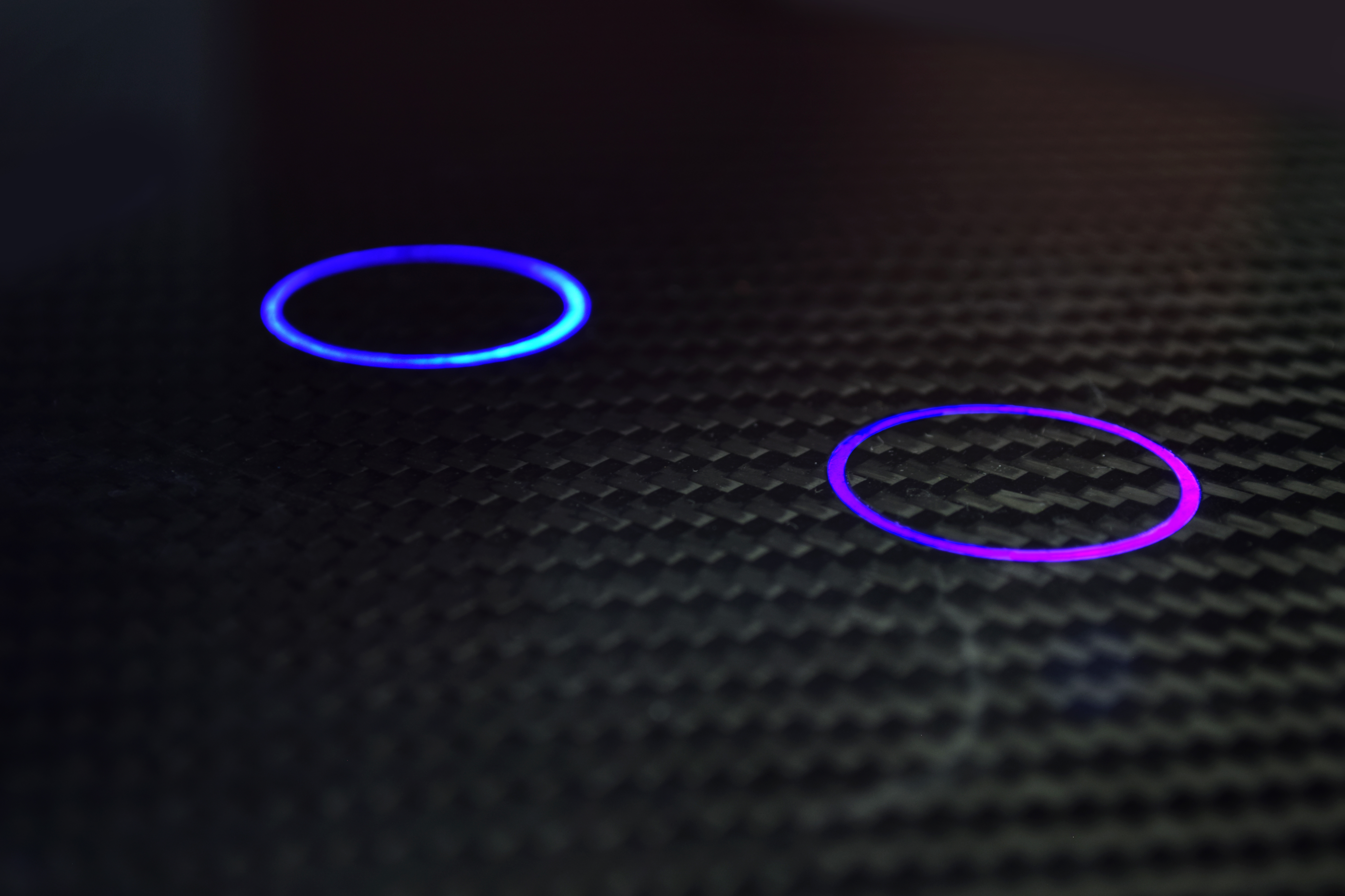 Close-up of carbon fiber composite surface with woven texture