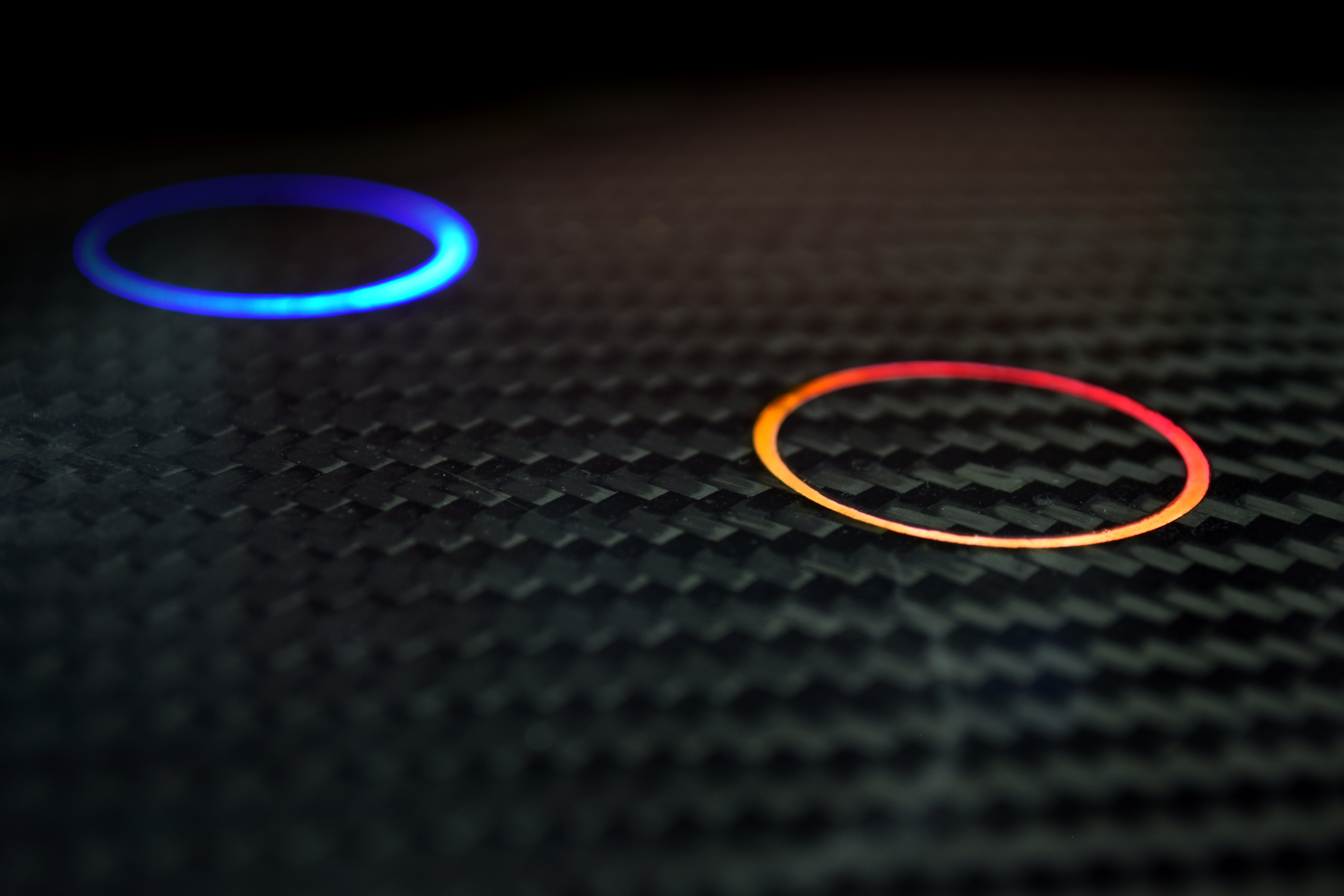 Carbon fiber surface detail with integrated sensor area