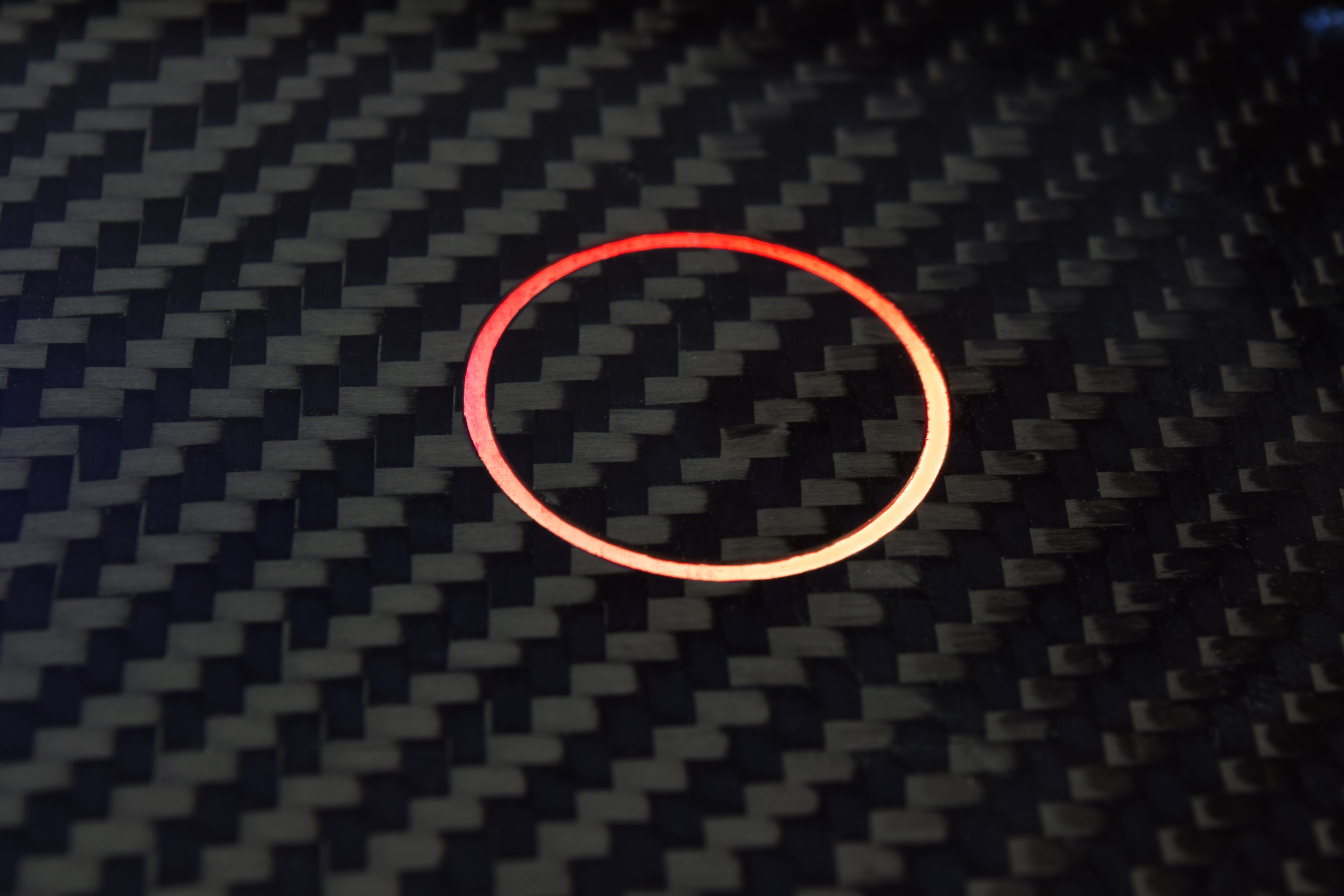 Carbon fiber panel detail showing material layup and finish